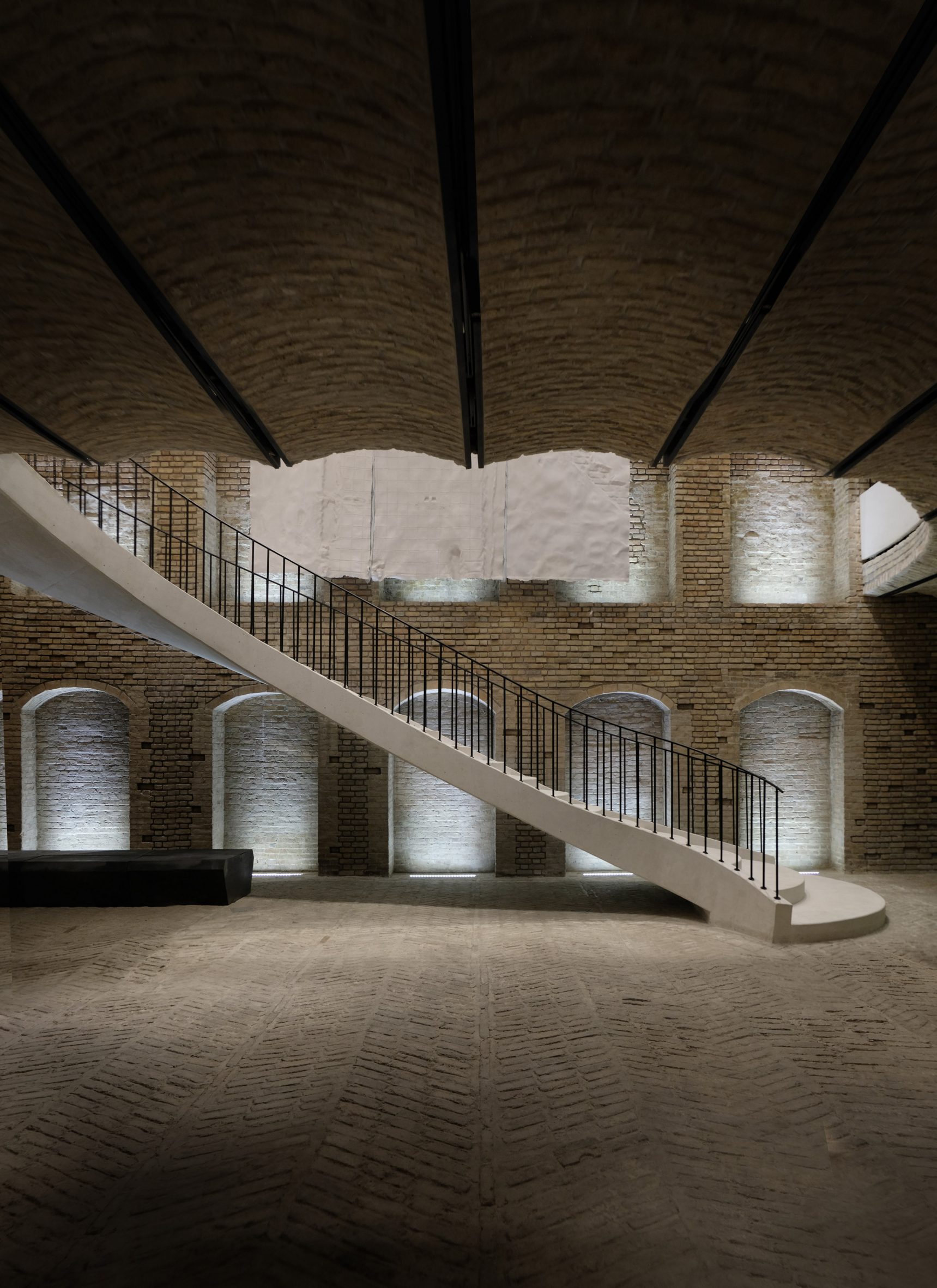 A historic building facade blending with modern architectural elements, symbolizing adaptive reuse in an urban core.