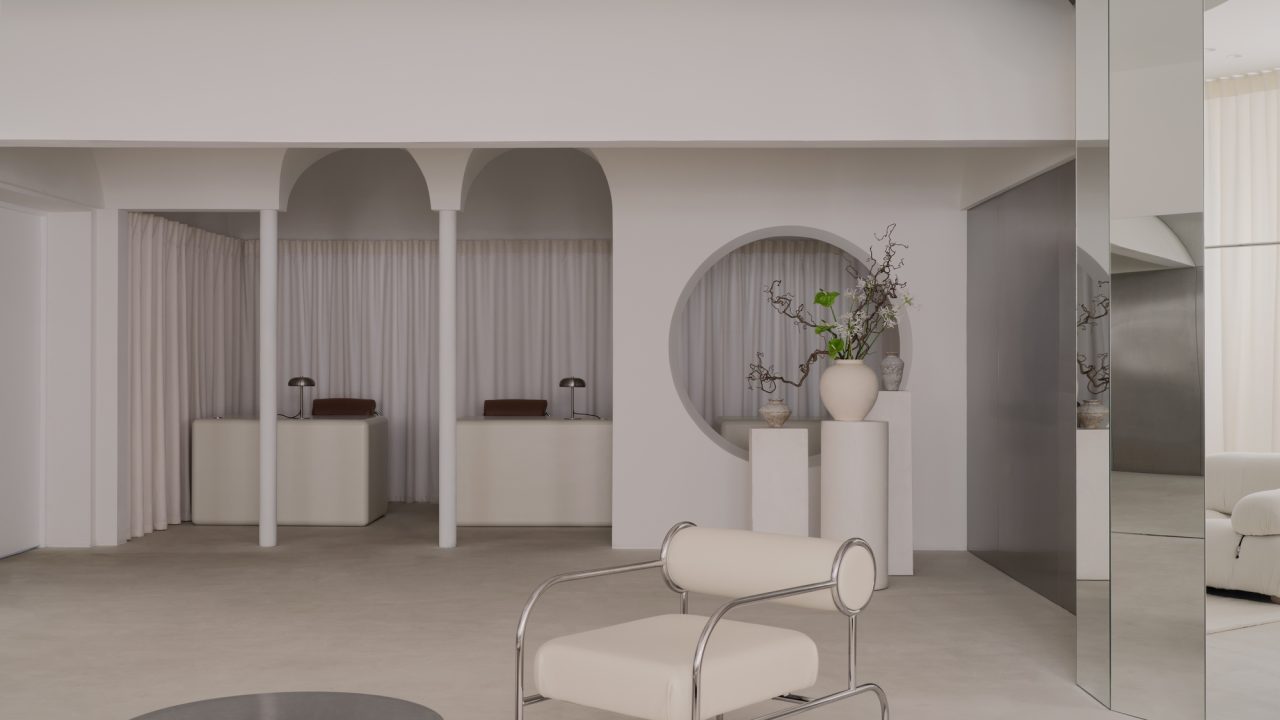 UP2DATE architects Transforms Industrial Shell into Serene Malli Showroom in Almaty