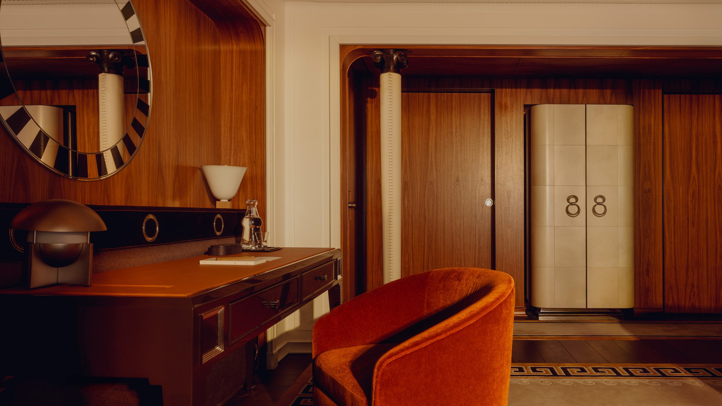 Interior of a luxurious yacht or houseboat with stylish furnishings and nautical elements.