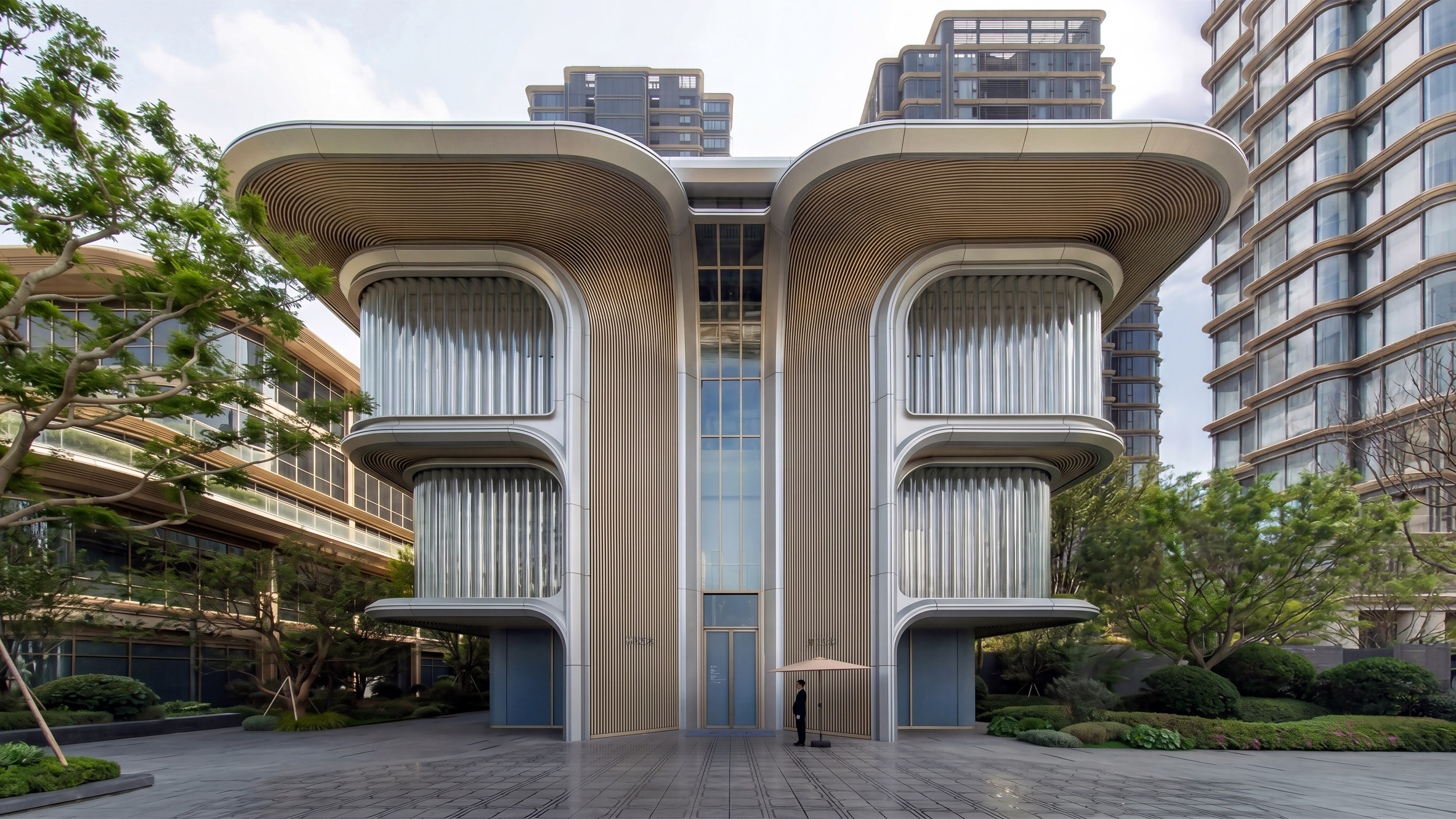 Exterior view of the Jia Art gallery in Shanghai by Foster + Partners, showcasing its stepped silhouette and ribbed glass facade.