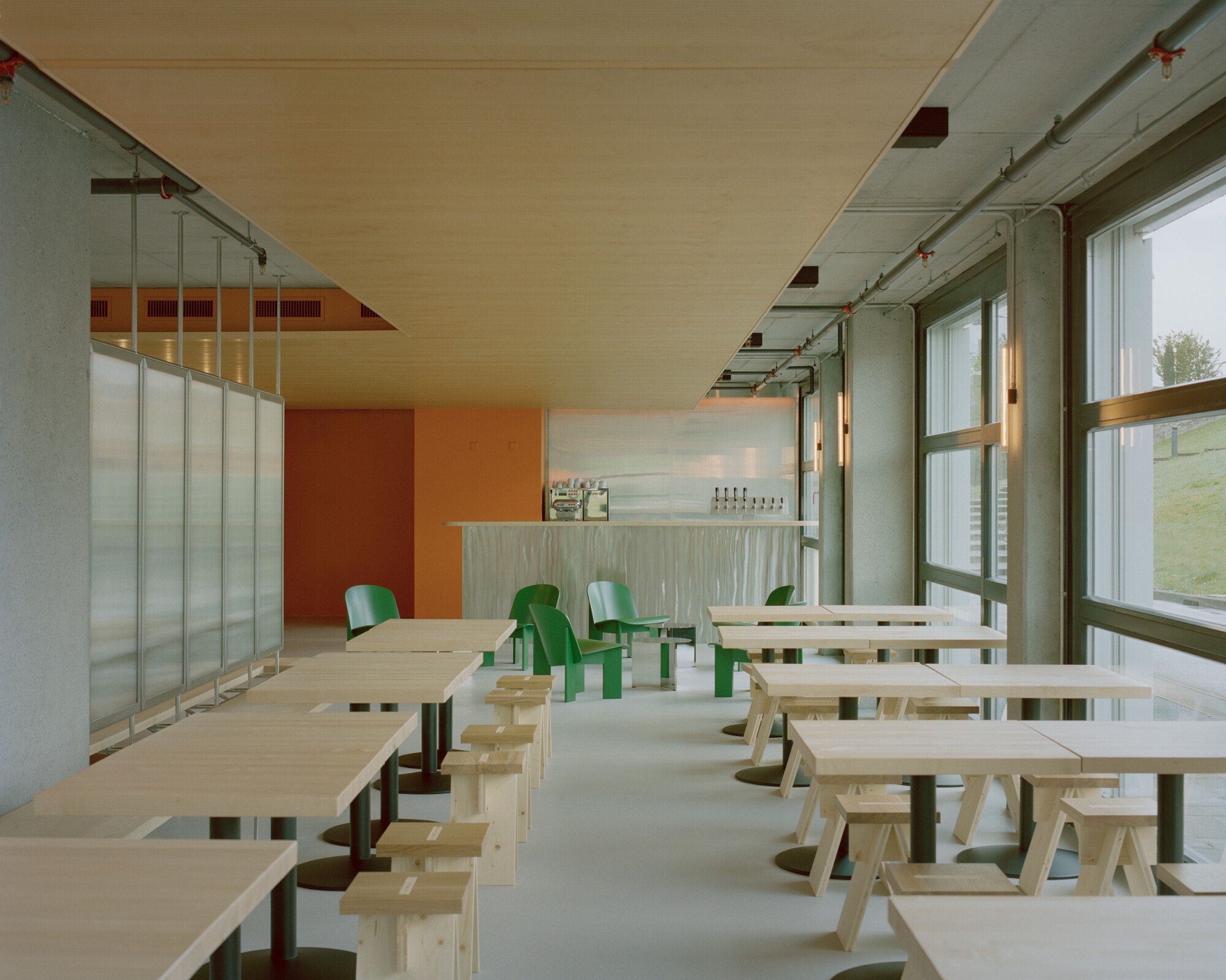 Interior view of the Eleventhfloor Restaurant, showing the central wall feature and dining area.
