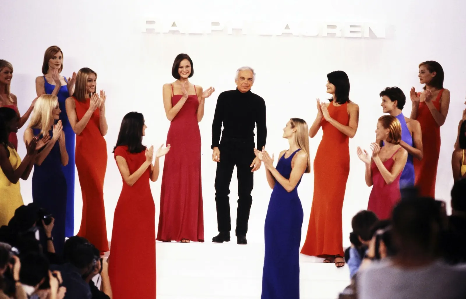 A collection of new fashion books displayed with imagery of designers like Ralph Lauren and Virgil Abloh.