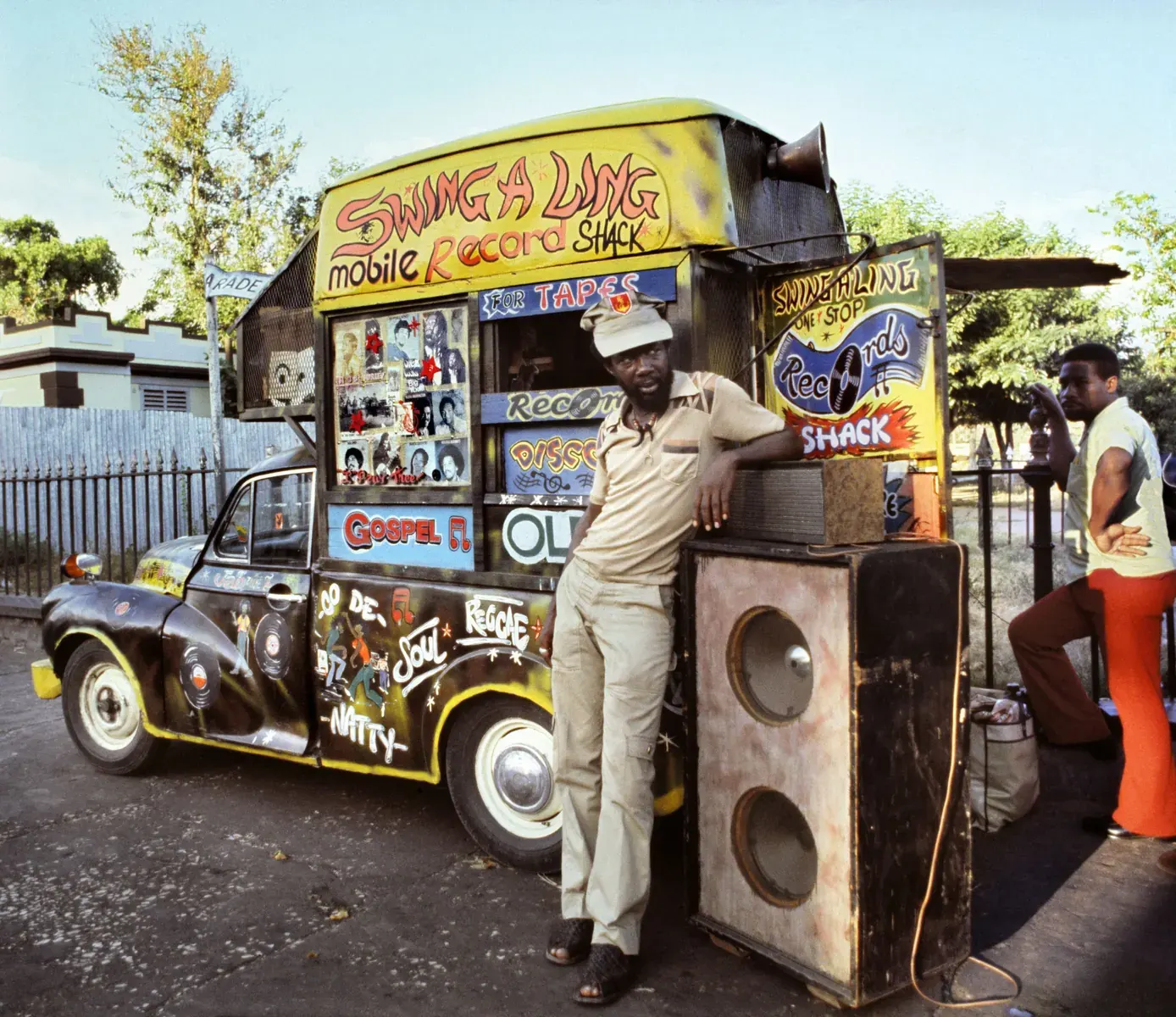 An exhibition space at the Museum of Contemporary Art Chicago displaying art and artifacts related to dancehall and reggaetón music.