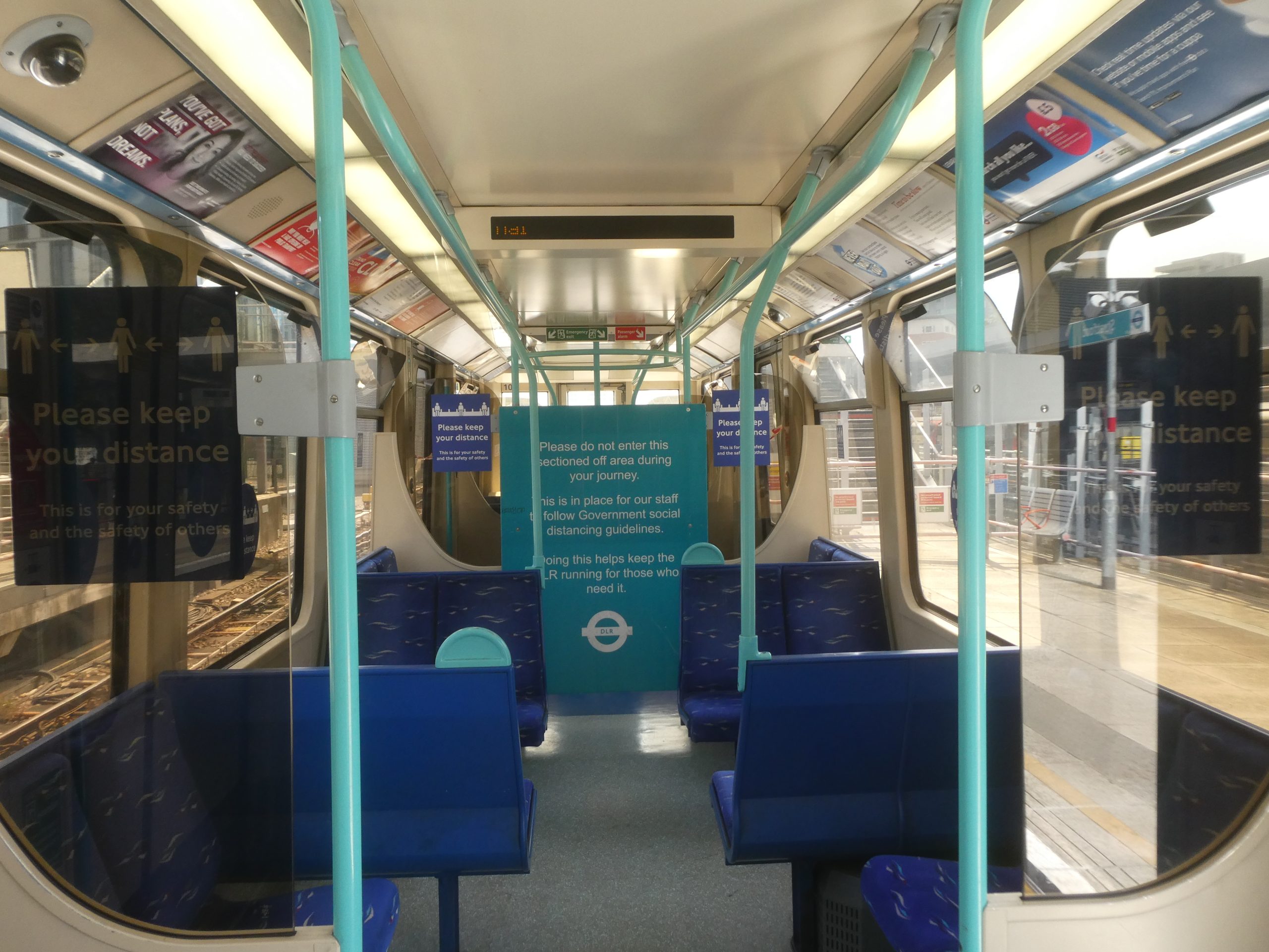 Interior of a Jakarta urban bus, highlighting the passenger experience.