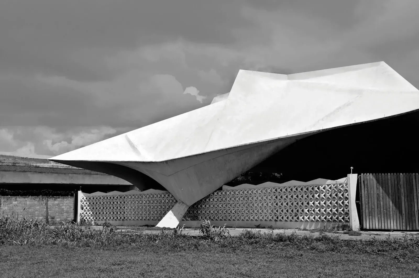 A montage of architectural sketches, book covers, and project renderings.