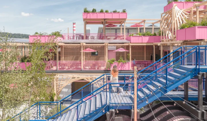 Hello Wood Unveils Vibrant Pink Timber Complex on Former Zurich Railway Site