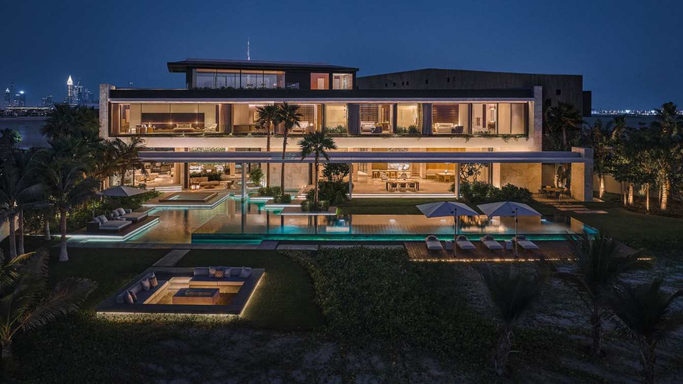 Exterior view of Island Villa in Dubai, showcasing its modern architecture and proximity to the sea.