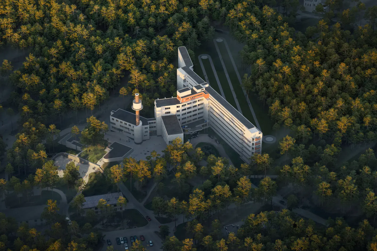 Exterior view of the Paimio Sanatorium with Snøhetta's proposed renovations, showcasing a blend of original modernist architecture and new interventions.