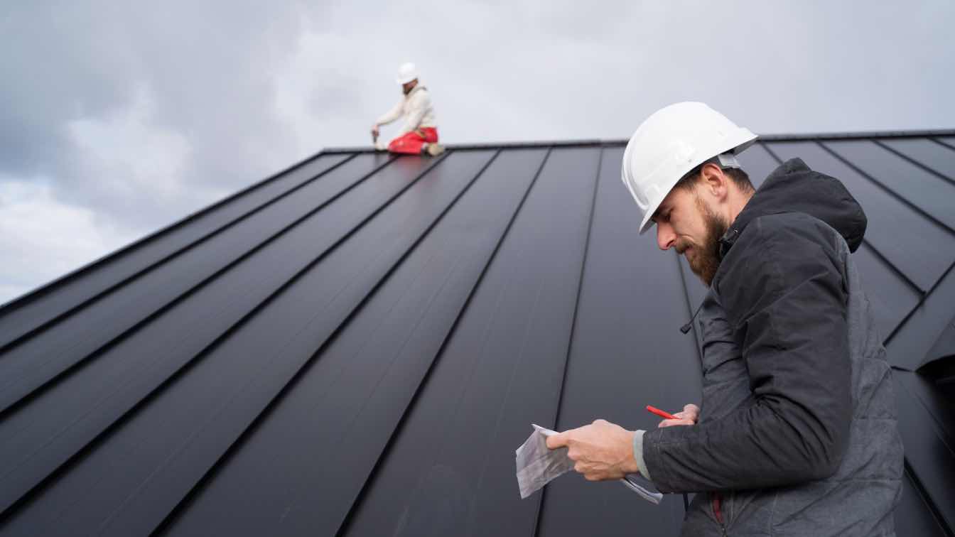A close-up view of a building's roof showcasing an advanced protective layer with a reflective surface.