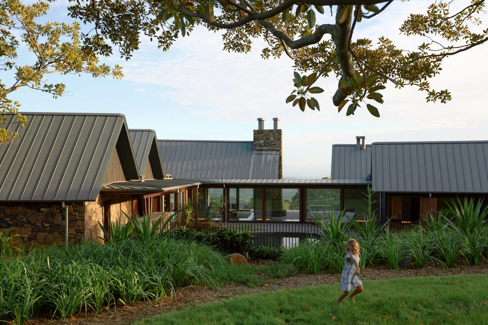 Saddleback Mountain House, designed by Casey Brown Architecture, showcasing its integration with the surrounding mountainous terrain and natural materials.