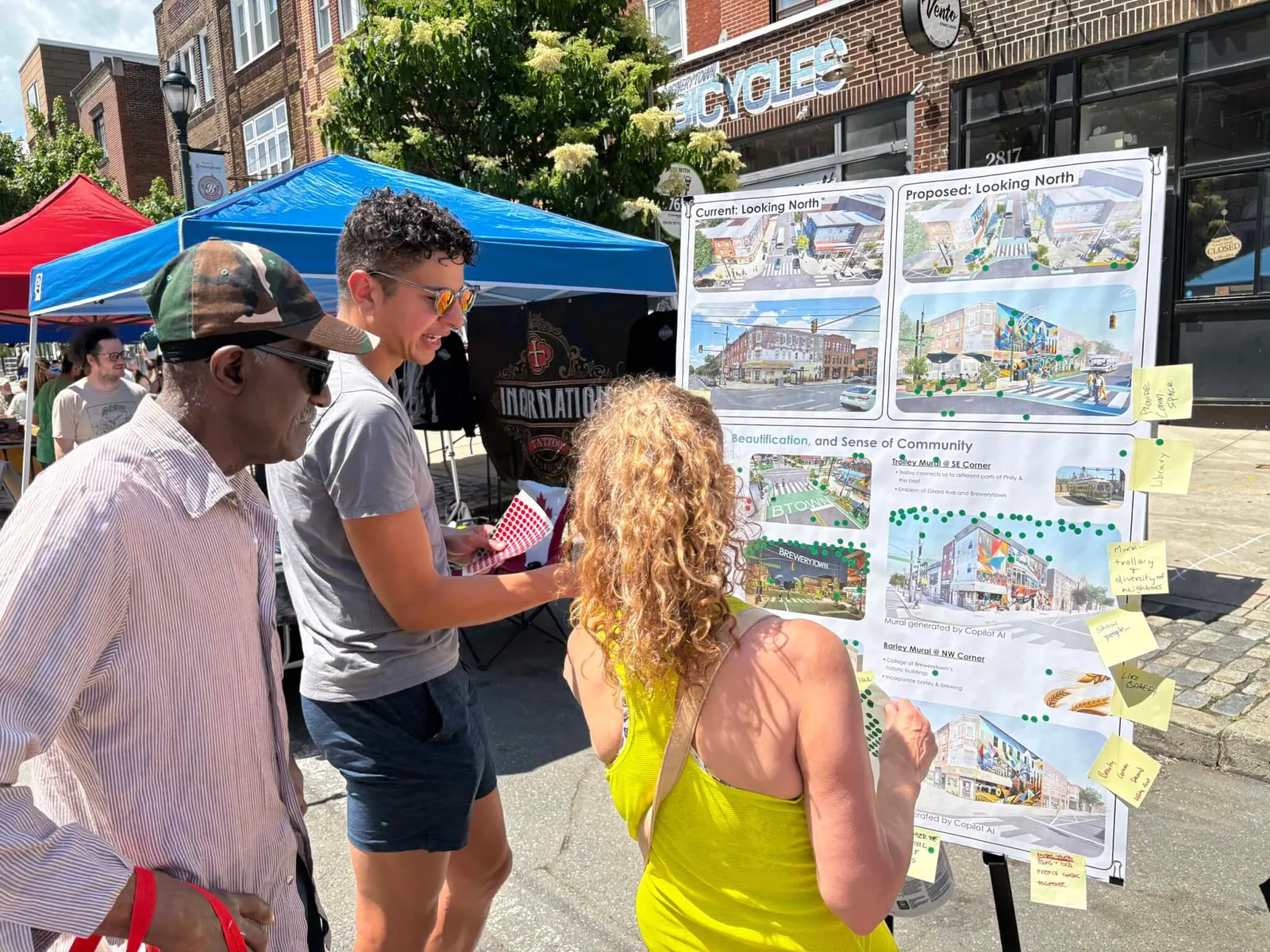 Volunteers and community members collaborating on a design project for a neighborhood center.