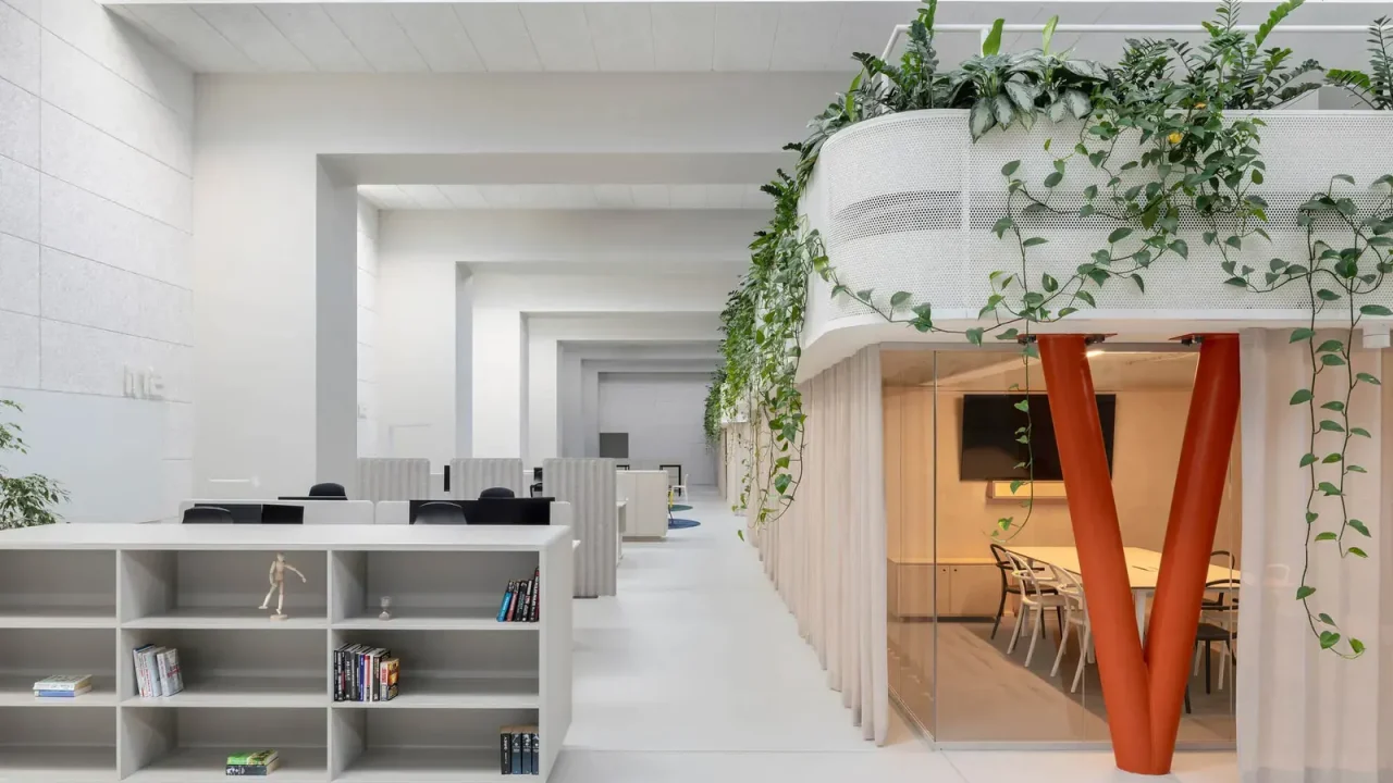 KIP Arhitekti Transforms Historic Printing House into Modern Halcom Offices