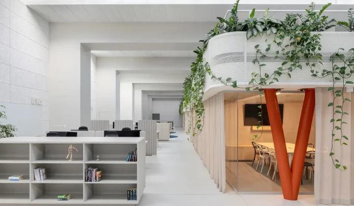 KIP Arhitekti Transforms Historic Printing House into Modern Halcom Offices