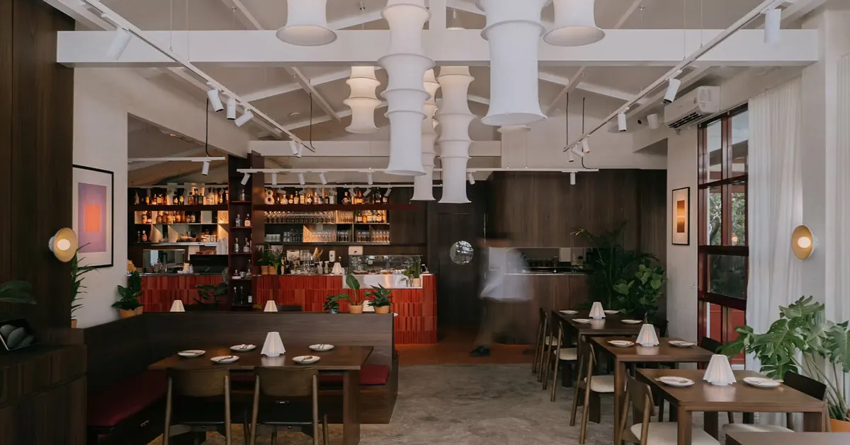 Pachapasa Studio turns Bangkok house into ARVIE restaurant with lantern-like pavilion and recycled brick bar