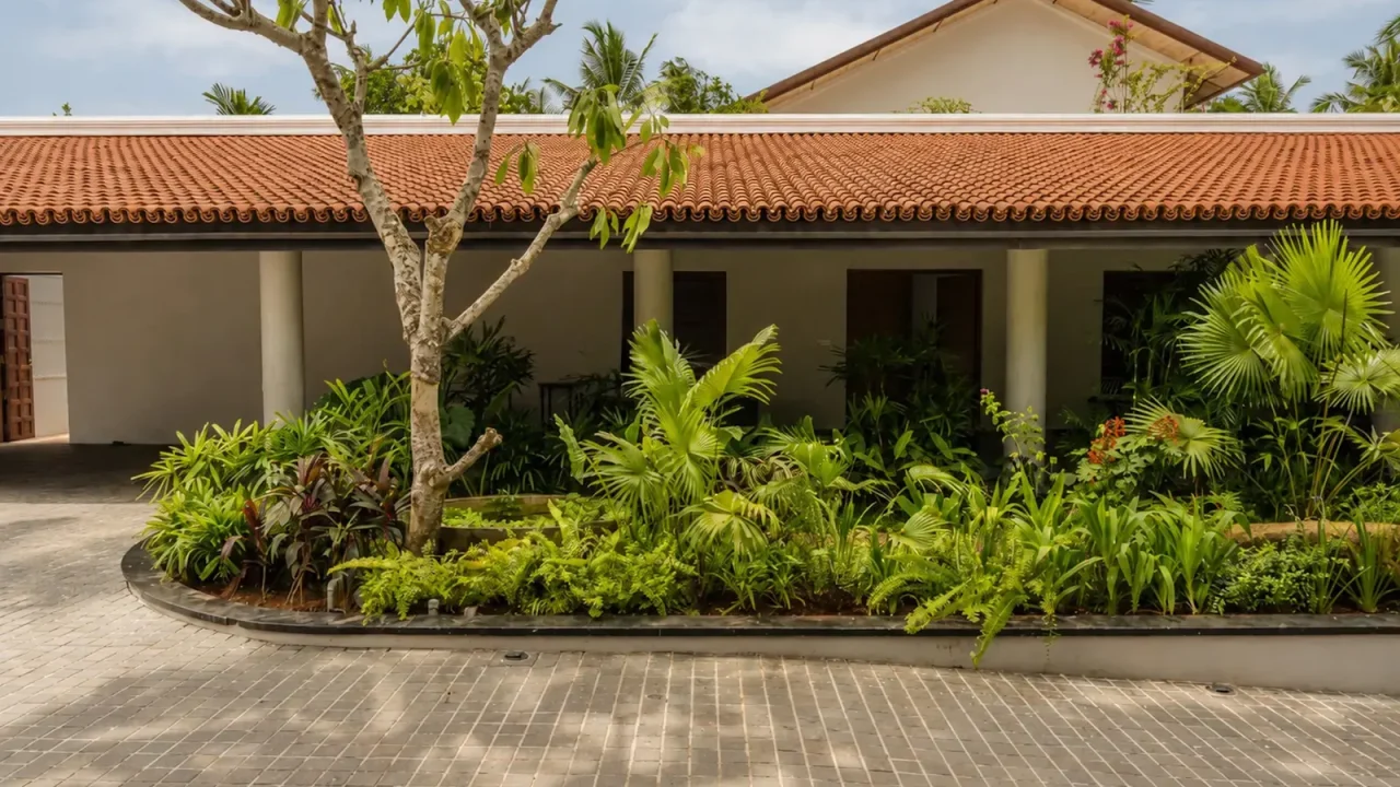 Ochre Residence by Thought Parallels Draws on Earthy Materials for a Warm Home in Kerala