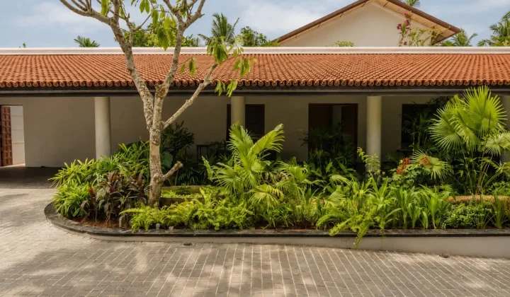 Ochre Residence by Thought Parallels Draws on Earthy Materials for a Warm Home in Kerala
