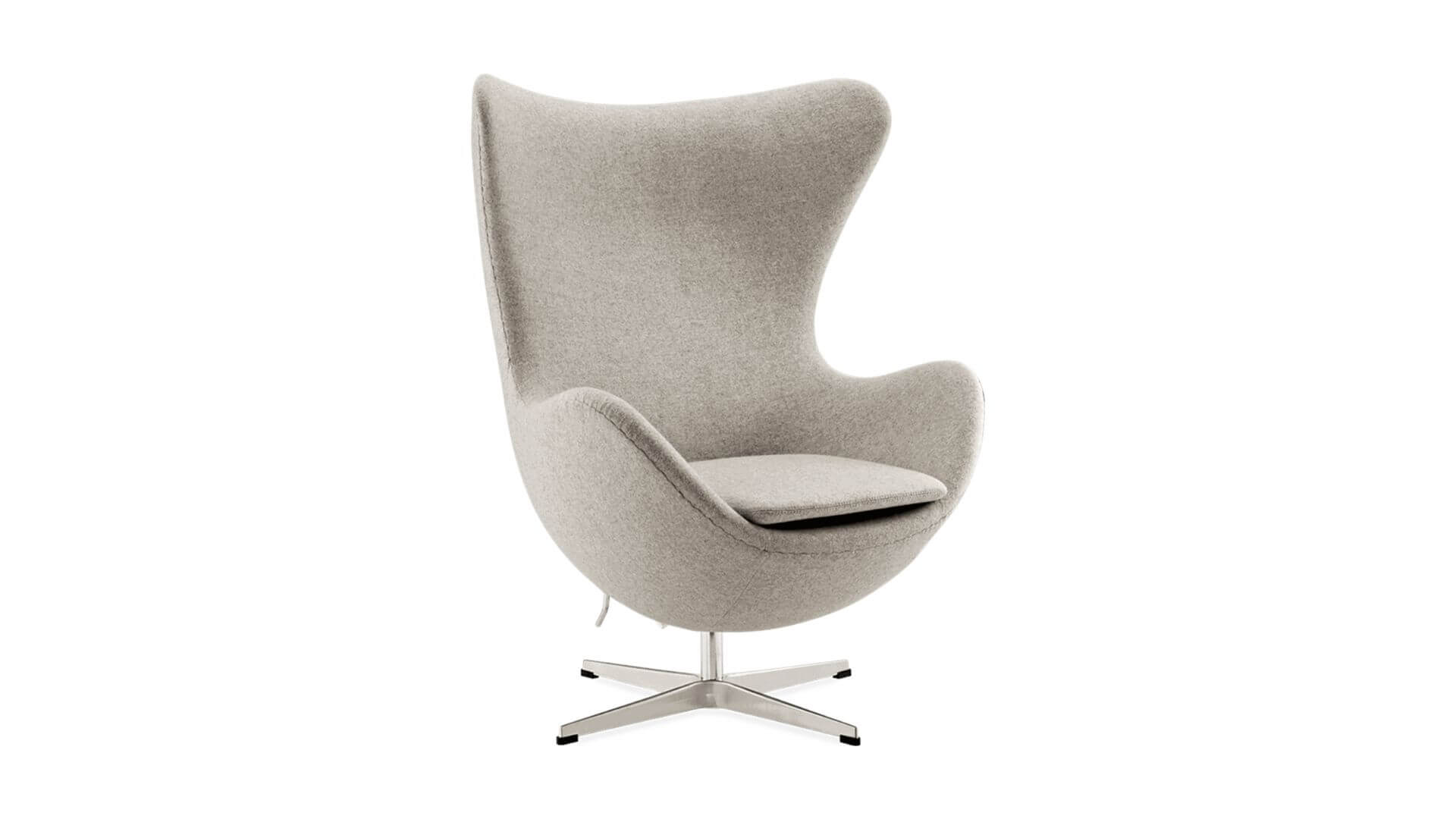 A modern living space with concrete walls and large windows, featuring a single, organically shaped sculptural chair in the foreground.