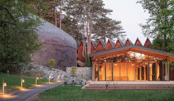 Copper Shingles Clad Curving Concert Hall ‘La Source Vive’ in Évian, France