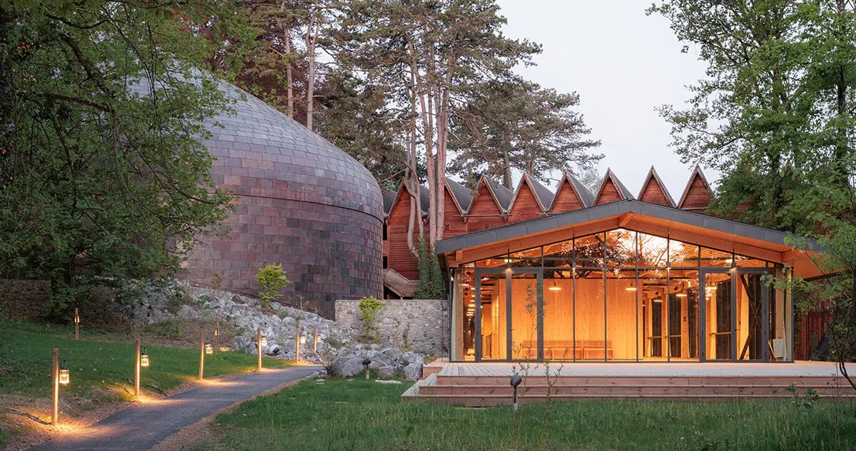 Copper Shingles Clad Curving Concert Hall ‘La Source Vive’ in Évian, France