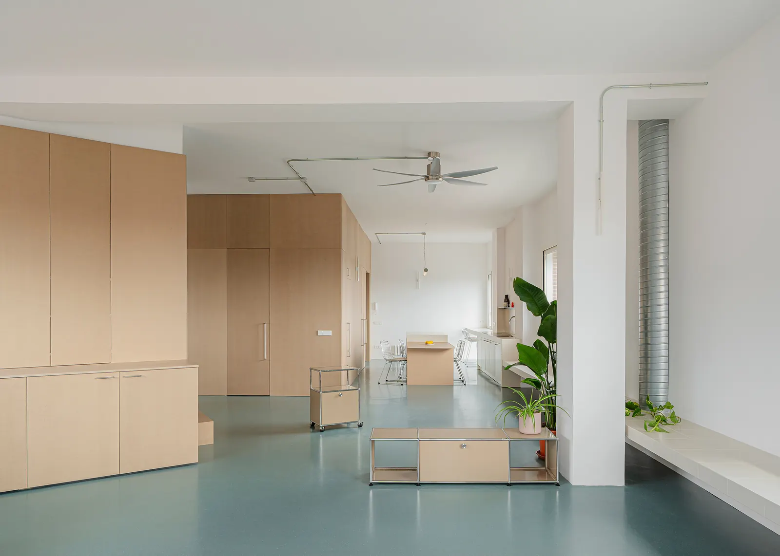 Interior of Aguacate Space, a renovated apartment in Carabanchel, Madrid, designed by ALE Estudio, showing a mix of original and contemporary elements