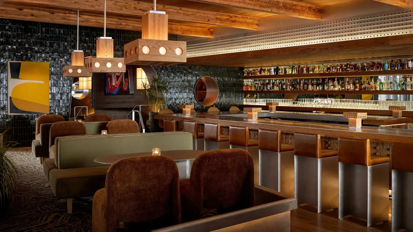Stable Palms Club interior with red oak ceiling, stainless steel bar and sunken conversation pit in Calgary