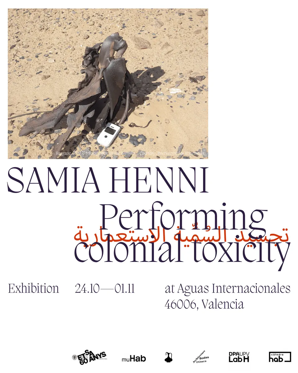 Exhibition view of Performing Colonial Toxicity at Aguas Internacionales, Valencia, featuring archival materials and multimedia displays on French nuclear colonialism in the Sahara