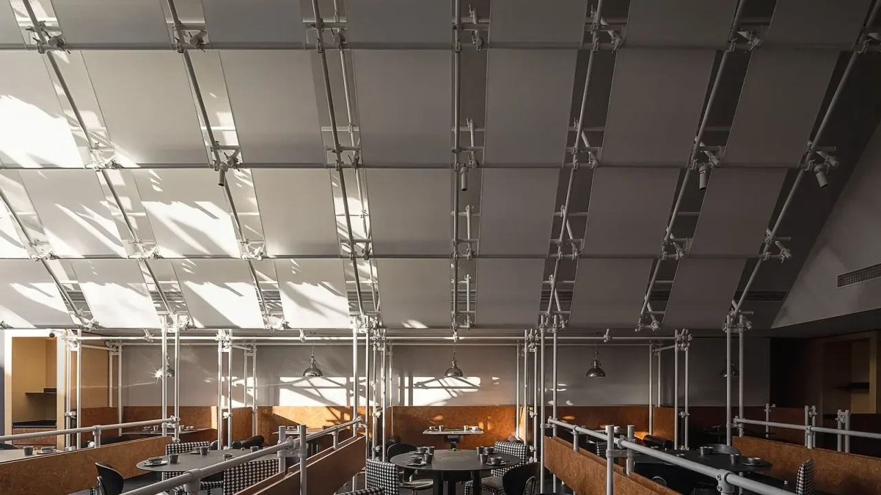 Scaffolding as Interior Architecture: Adaptable Systems Challenge the Divide Between Temporary and Permanent
