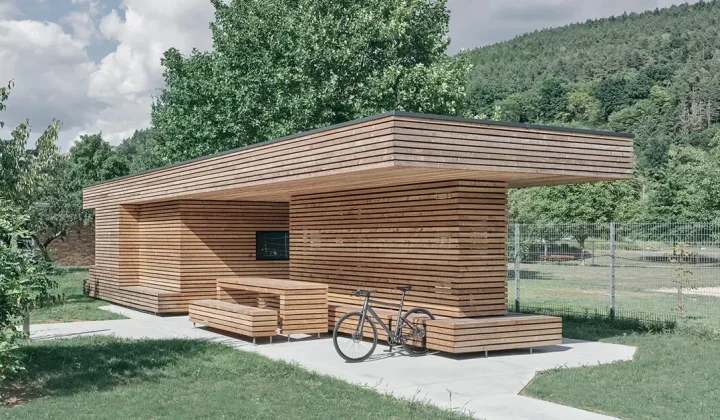 ToB.Studio’s Timber Bike Station in Burgsinn Echoes a Stacked Log Pile